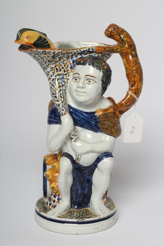 A RALPH WOOD PRATT TYPE PEARLWARE BACCHUS  AND PAN JUG Image