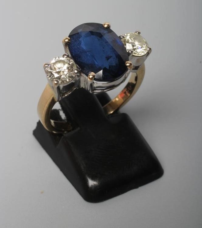 A THREE STONE SAPPHIRE AND DIAMOND RING Image
