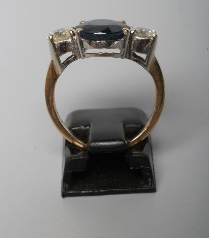 A THREE STONE SAPPHIRE AND DIAMOND RING Image