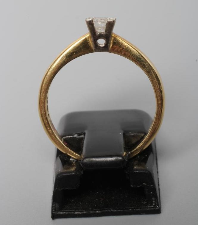 A SOLITAIRE DIAMOND RING Image