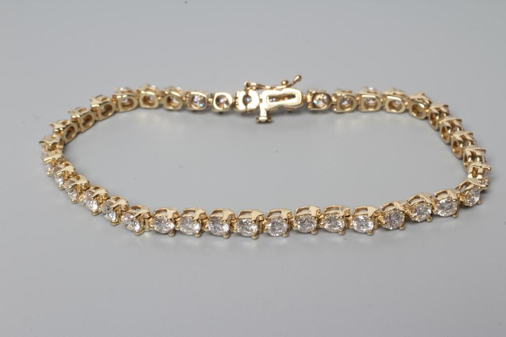 A DIAMOND TENNIS BRACELET Image