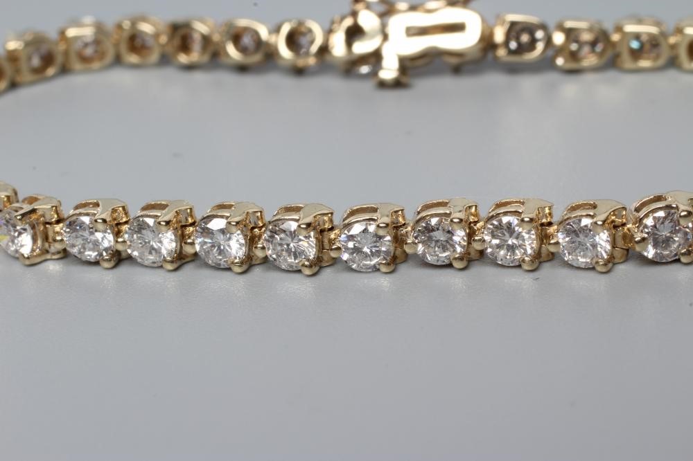 A DIAMOND TENNIS BRACELET Image