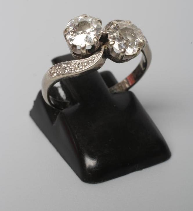 A TWO STONE DIAMOND CROSSOVER RING Image