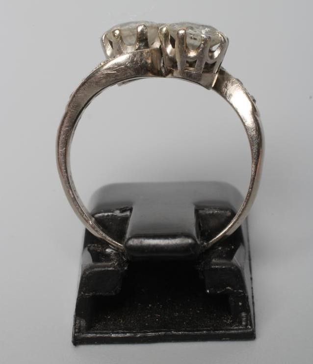 A TWO STONE DIAMOND CROSSOVER RING Image