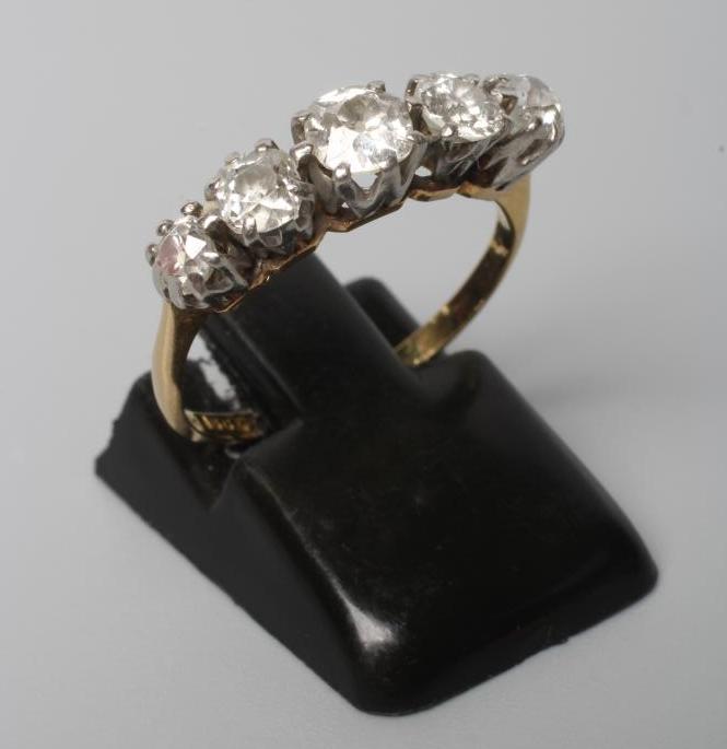 A FIVE STONE DIAMOND RING Image