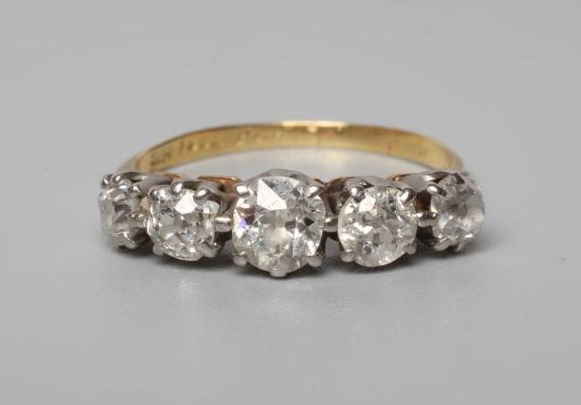 A FIVE STONE DIAMOND RING Image