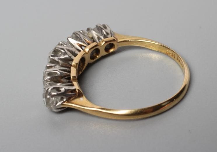 A FIVE STONE DIAMOND RING Image