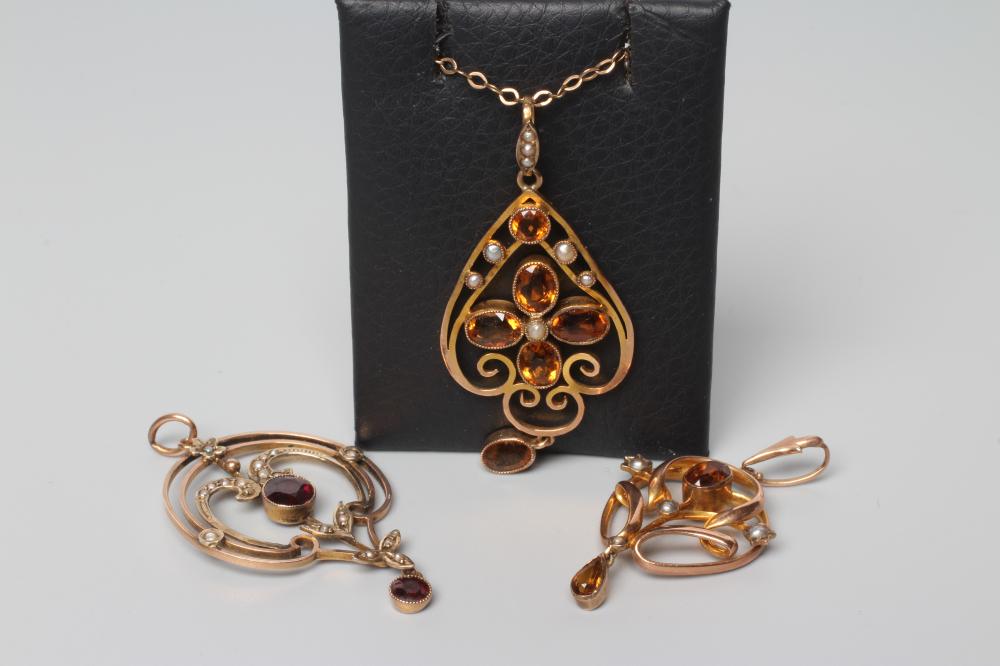 THREE EDWARDIAN OPEN SHIELD PENDANTS Image