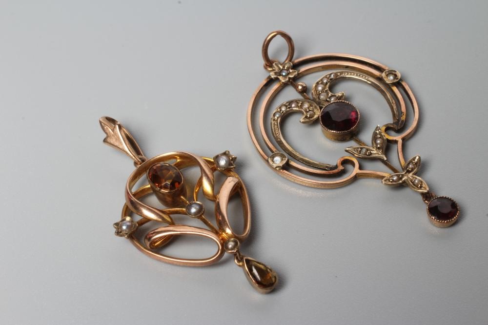 THREE EDWARDIAN OPEN SHIELD PENDANTS Image