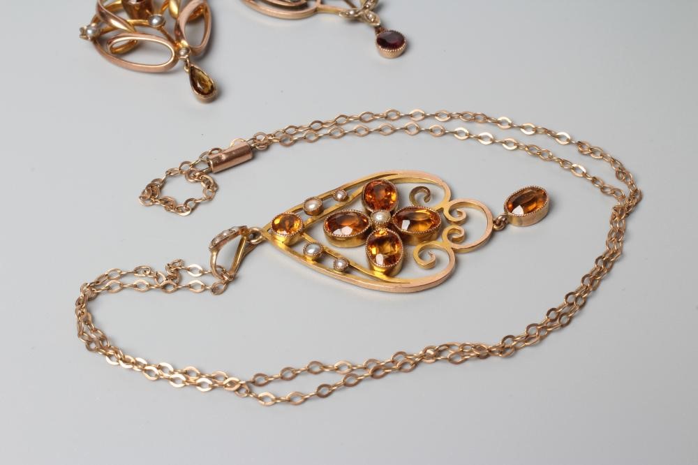 THREE EDWARDIAN OPEN SHIELD PENDANTS Image