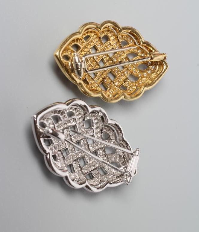 A PAIR OF DIAMOND CLIP BROOCHES of lobed lozenge form Image