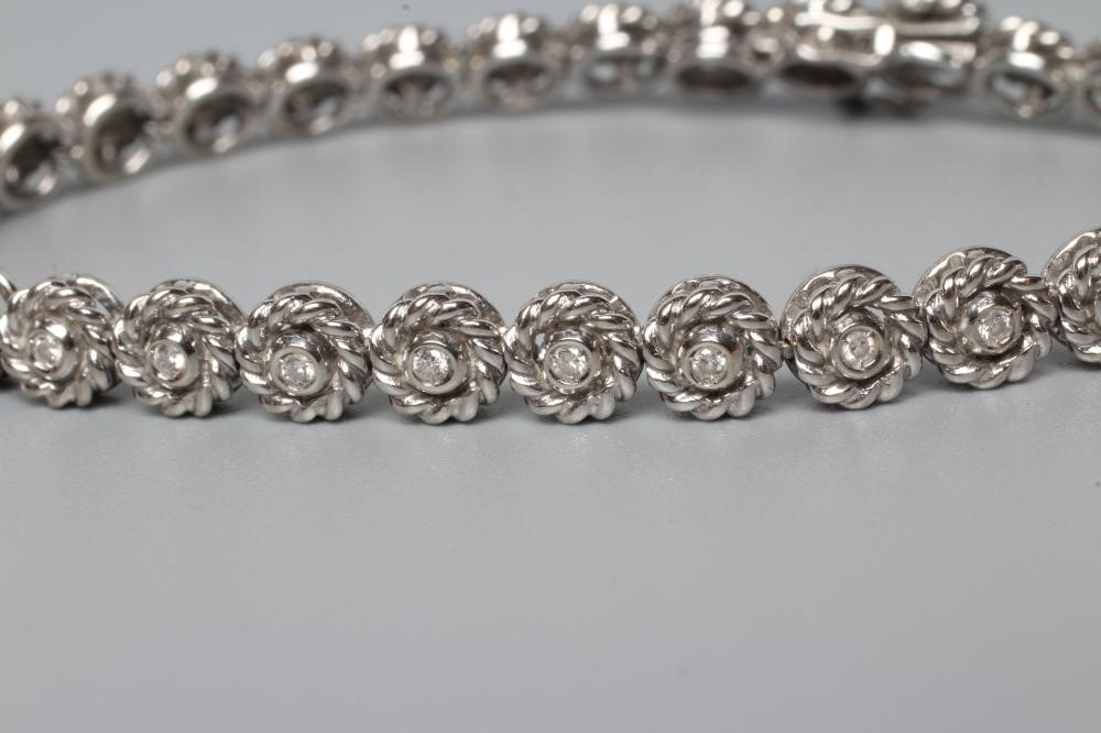 A DIAMOND TENNIS BRACELET Image