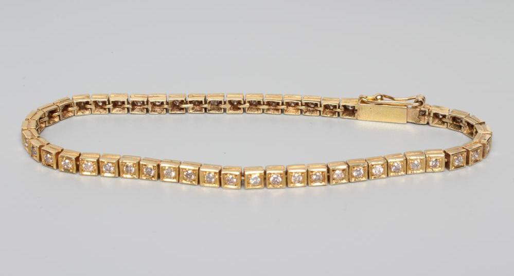 A DIAMOND TENNIS BRACELET Image