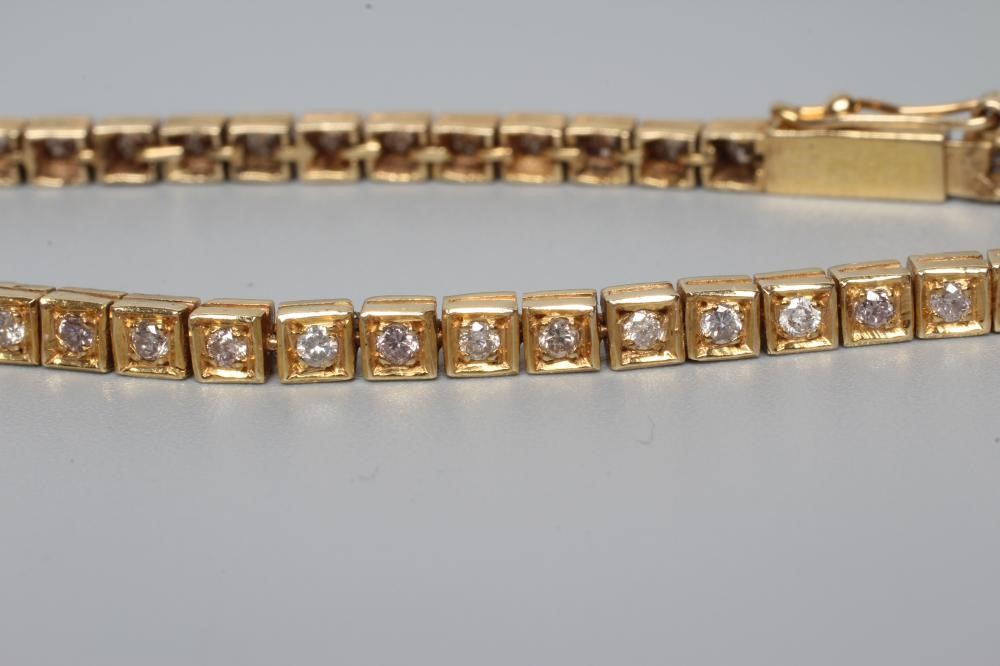 A DIAMOND TENNIS BRACELET Image