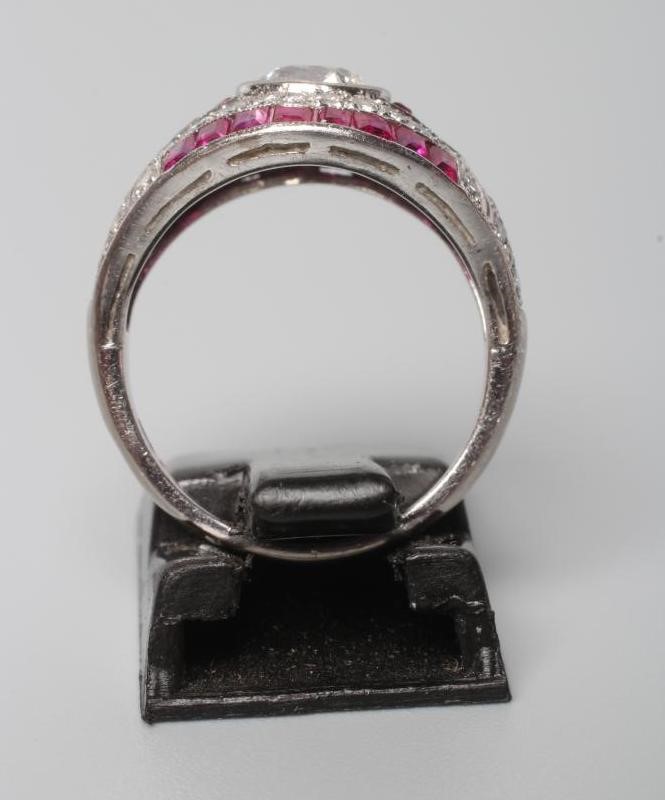 AN ART DECO DIAMOND AND RUBY RING Image