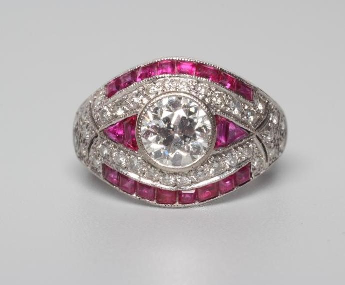 AN ART DECO DIAMOND AND RUBY RING Image