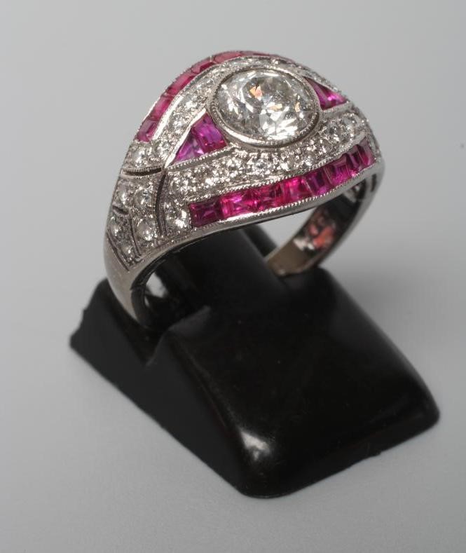 AN ART DECO DIAMOND AND RUBY RING Image