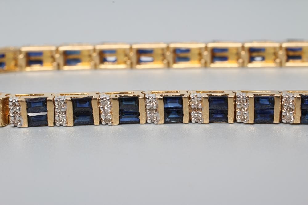 A SAPPHIRE AND DIAMOND LINE BRACELET Image