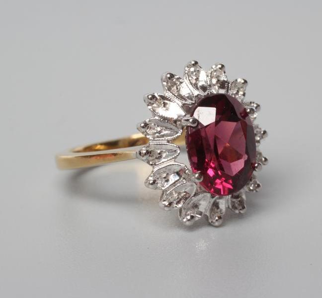 A TOURMALINE AND DIAMOND CLUSTER RING Image