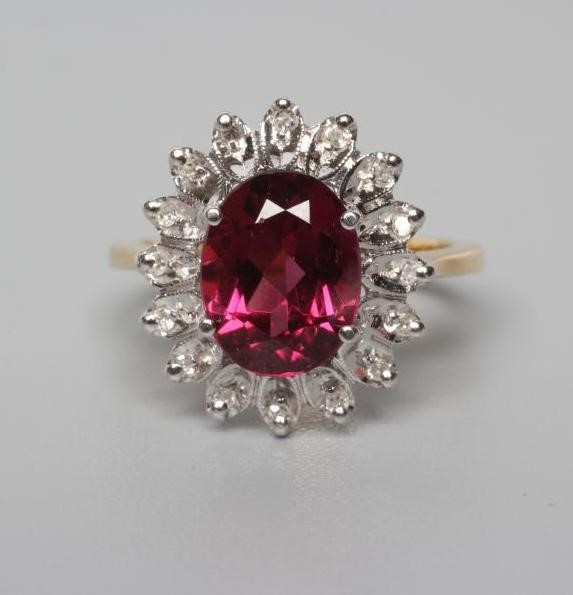 A TOURMALINE AND DIAMOND CLUSTER RING Image