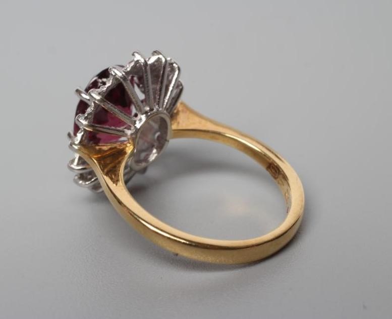 A TOURMALINE AND DIAMOND CLUSTER RING Image