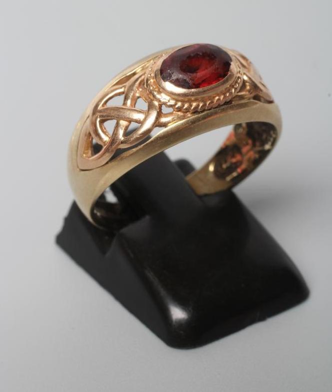 A GARNET RING Image