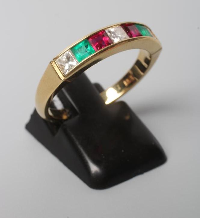 A MULTI GEM HALF HOOP RING Image