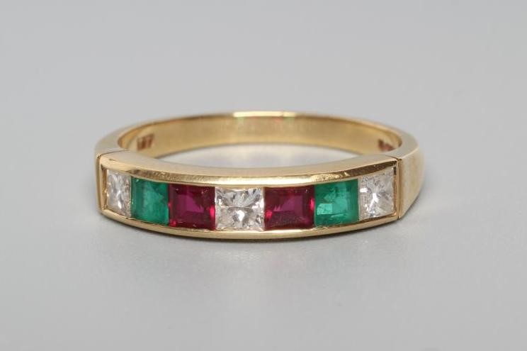 A MULTI GEM HALF HOOP RING Image