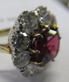 A RUBY AND DIAMOND CLUSTER RING Image