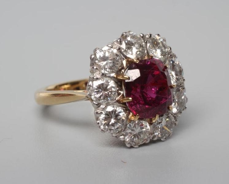 A RUBY AND DIAMOND CLUSTER RING Image