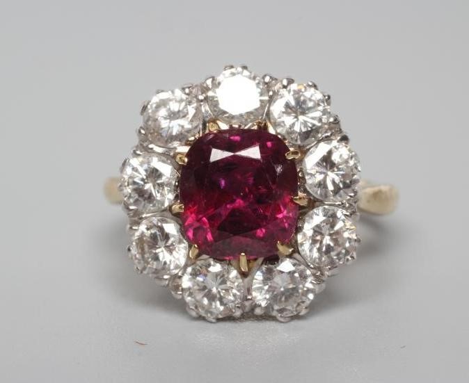 A RUBY AND DIAMOND CLUSTER RING Image