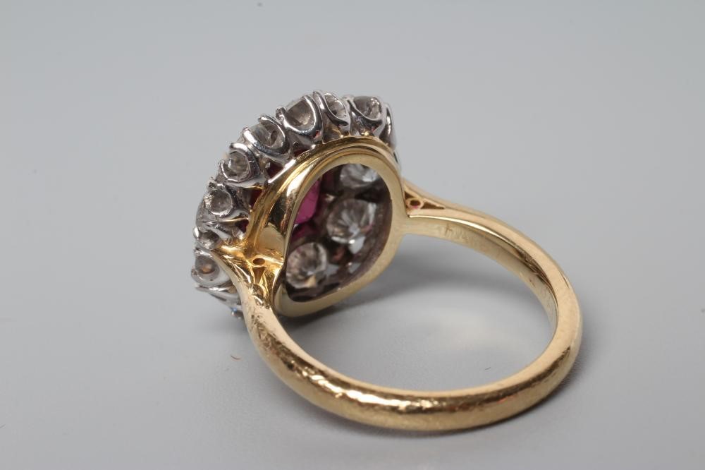 A RUBY AND DIAMOND CLUSTER RING Image
