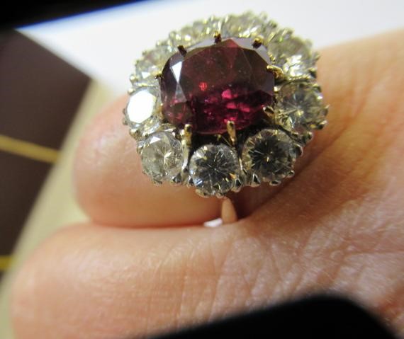 A RUBY AND DIAMOND CLUSTER RING Image