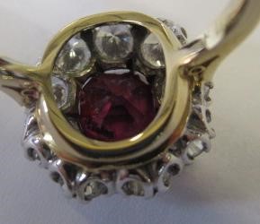 A RUBY AND DIAMOND CLUSTER RING Image