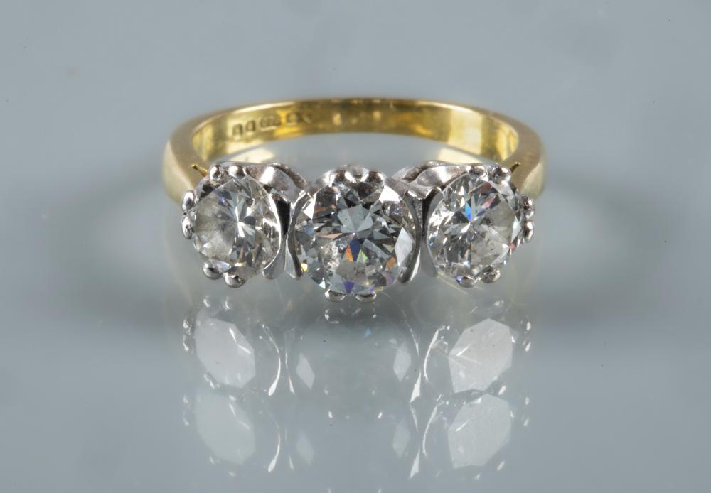 A THREE STONE DIAMOND RING Image