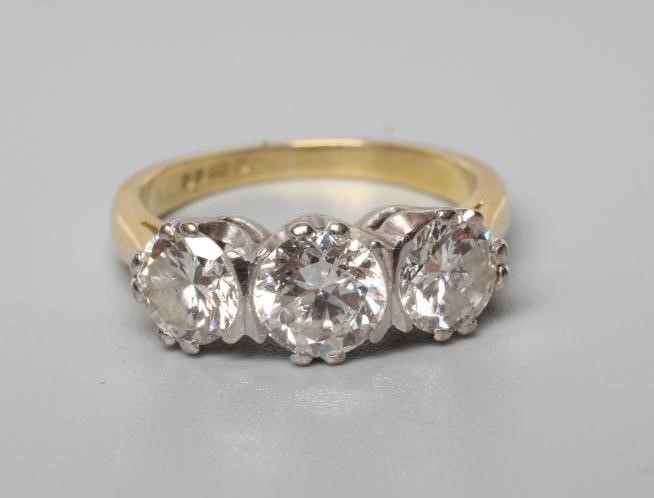 A THREE STONE DIAMOND RING Image