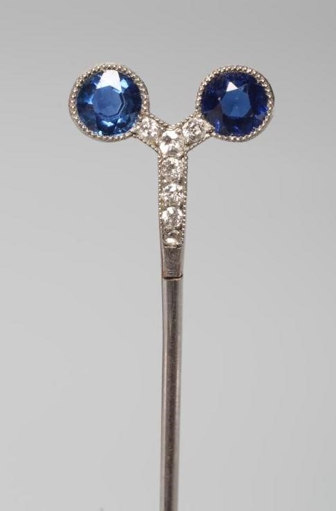 A CARTIER SAPPHIRE AND DIAMOND STICK PIN by Henri Droguet Image