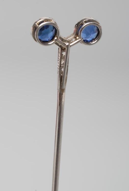 A CARTIER SAPPHIRE AND DIAMOND STICK PIN by Henri Droguet Image