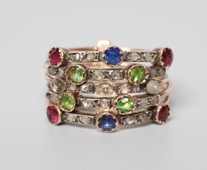 AN EDWARDIAN FIVE BAND MULTI-GEM RING Image