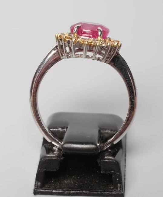 A RUBY AND DIAMOND CLUSTER RING Image