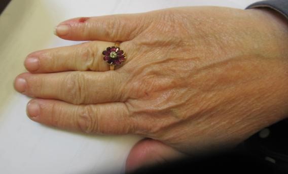 A VICTORIAN GARNET AND DIAMOND CLUSTER RING Image