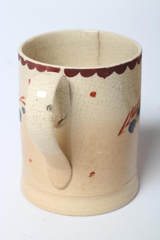 A NAMED CREAMWARE MUG Image