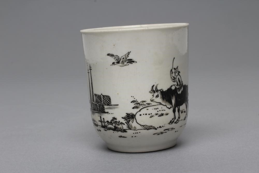 A FIRST PERIOD WORCESTER PORCELAIN BOY ON A BUFFALO COFFEE CUP Image