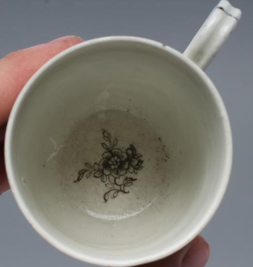A FIRST PERIOD WORCESTER PORCELAIN BOY ON A BUFFALO COFFEE CUP Image