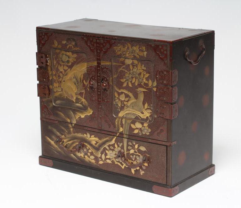 A JAPANESE LACQUERED TABLE CABINET Image