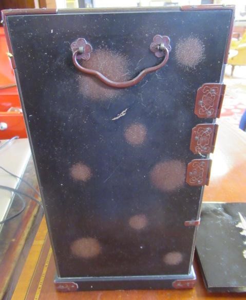 A JAPANESE LACQUERED TABLE CABINET Image