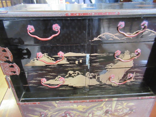 A JAPANESE LACQUERED TABLE CABINET Image