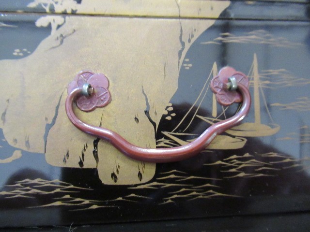 A JAPANESE LACQUERED TABLE CABINET Image