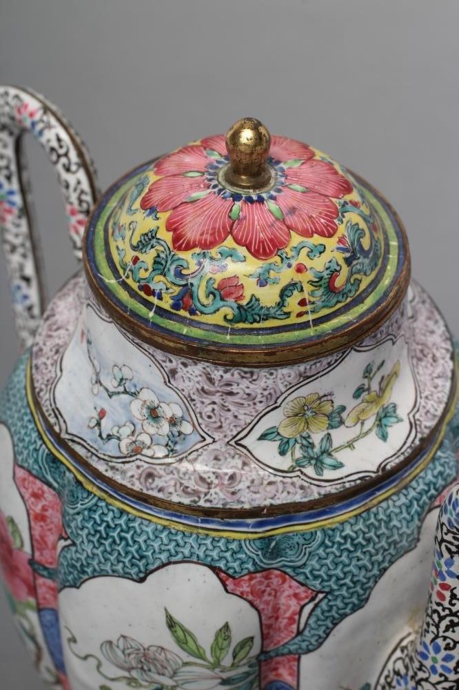 A CANTON ENAMEL WINE POT AND COVER of lobed cylindrical form with slender angular handle and curved Image