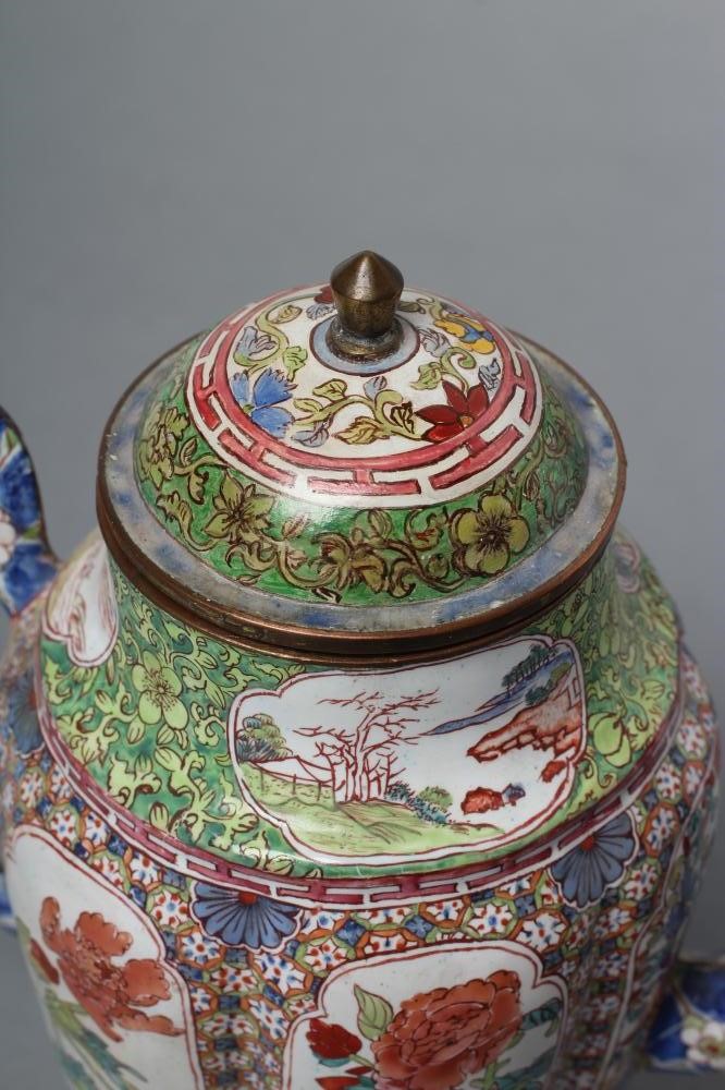 A CANTON ENAMEL WINE POT AND COVER of lobed cylindrical form with slender angular handle and curved Image